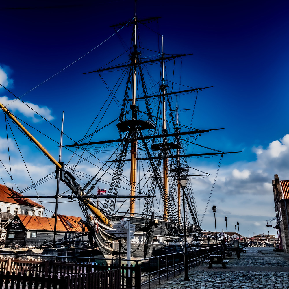 Joslin Rhodes - Ship docked at Hartlepool Marina under a clear blue sky.